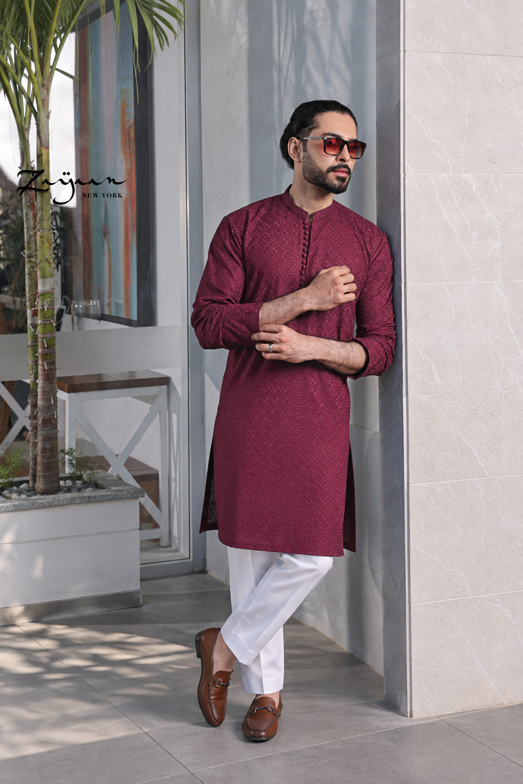 Model wearing Platinum Maroon Panjabi with subtle tonal detailing and white trousers